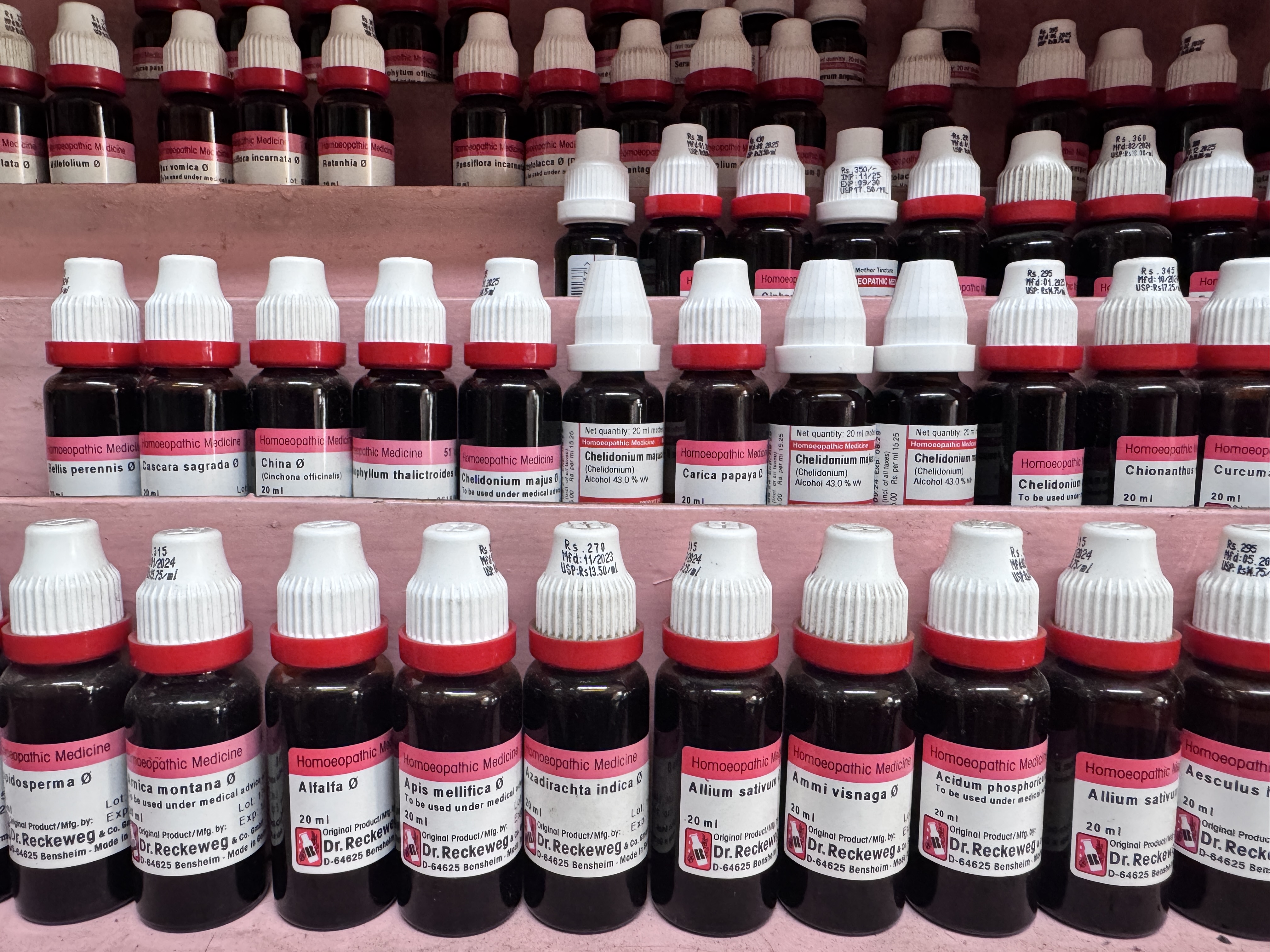 Homeopathic medicine bottles on Medicure shelves